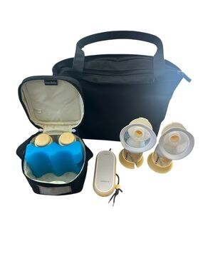 Medela Breast Pump Set with Black Carry Bag and Yellow Accents